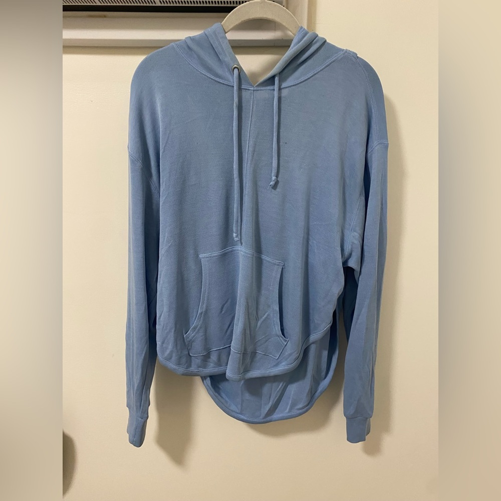 Free people light blue athletic hoody size S with cut outs in back